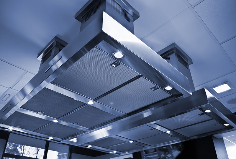 Range hood in the kitchen. Air ventilation system.